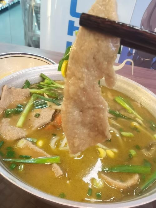 电梯上升时看猪肝如何翻过米线的桥